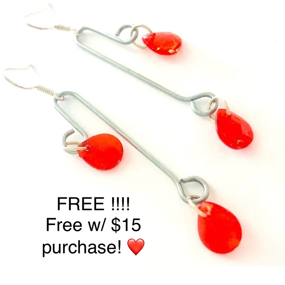 “Heart of Steel” earrings - New / New and in original packaging.